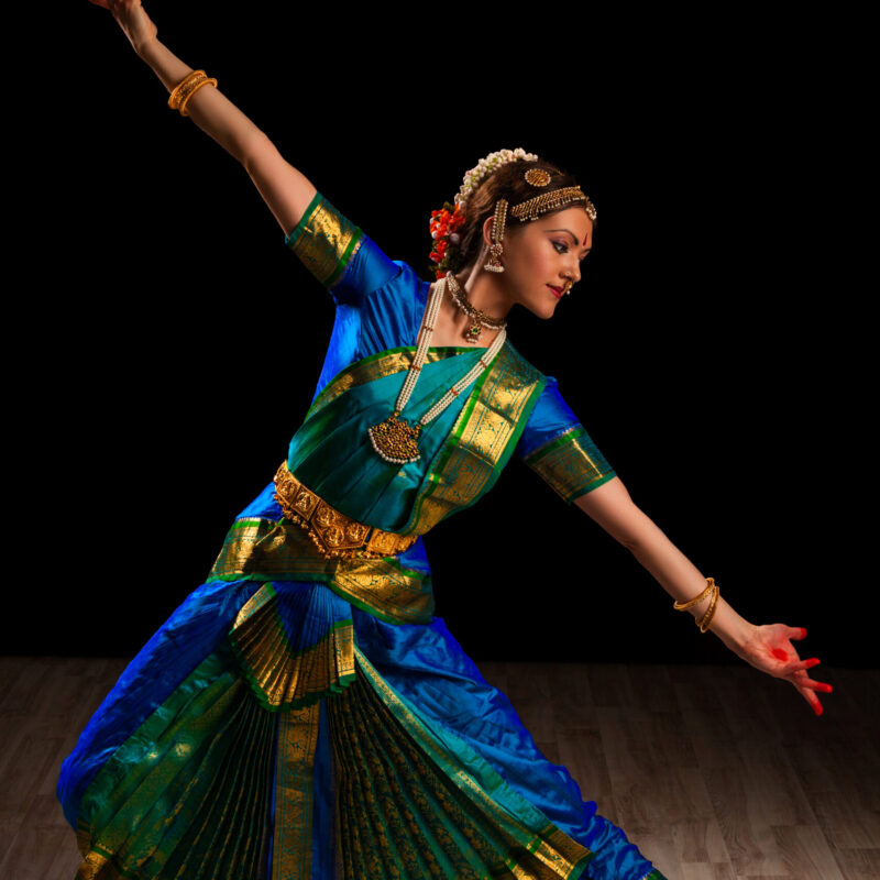 Young beautiful woman dancer exponent of Indian classical dance Bharatanatyam